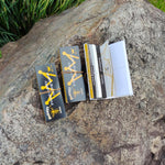 HORNET | Black 1-1/4 Size Rolling Paper With Tips